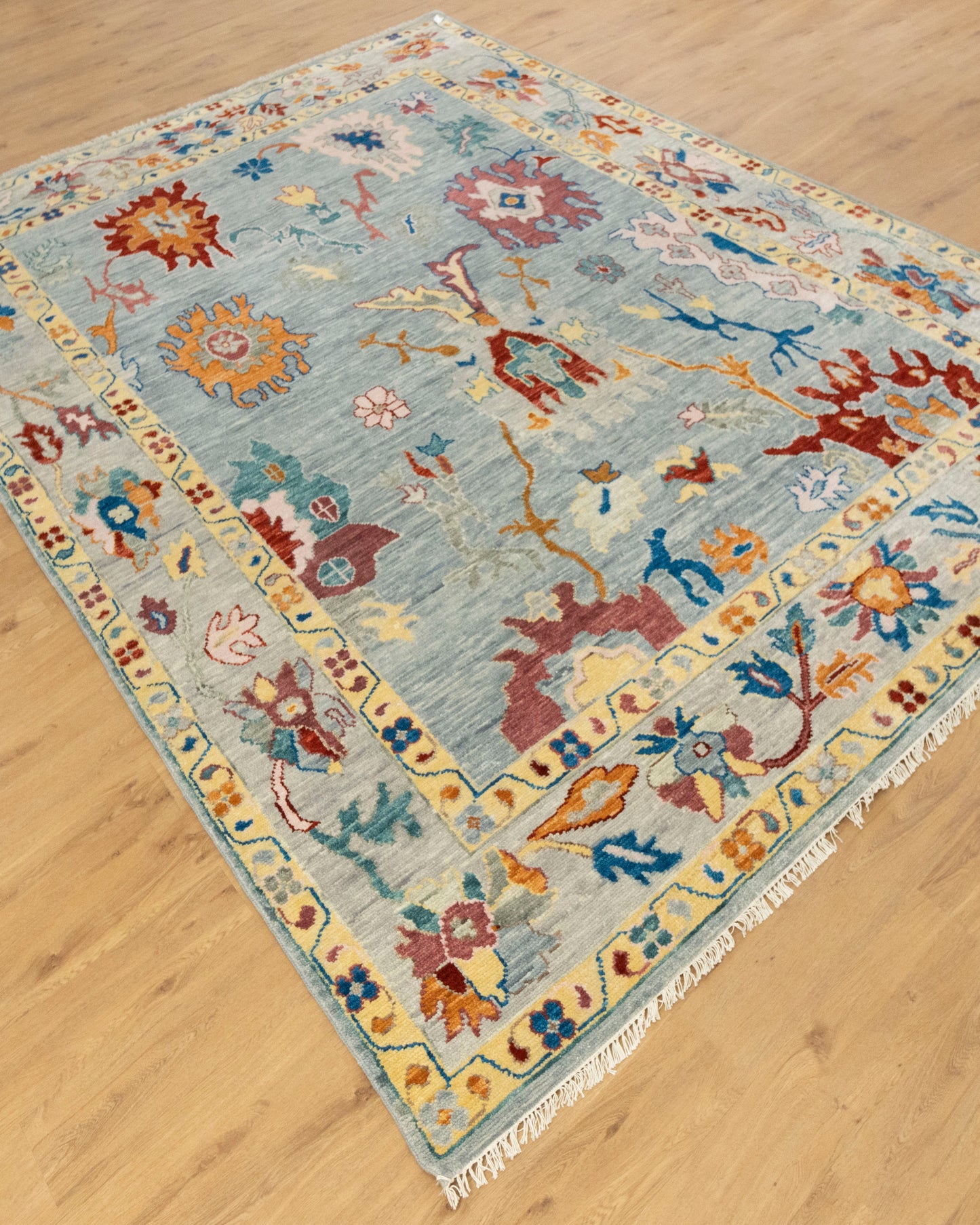 Unique Hand-Knotted Oushak Rug: A Blend of Color and Texture